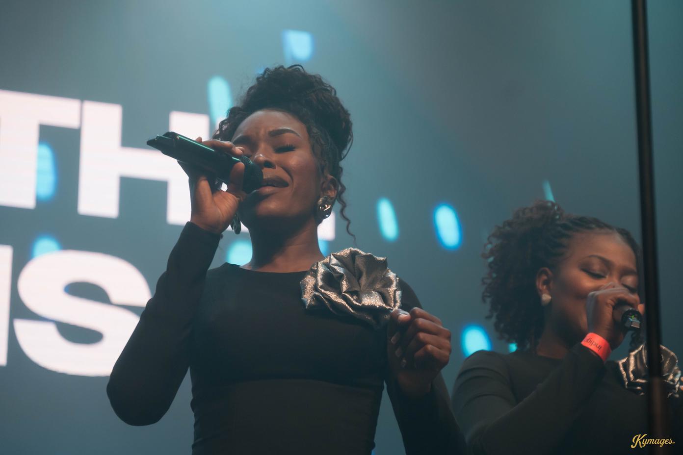 Worship team leading on stage